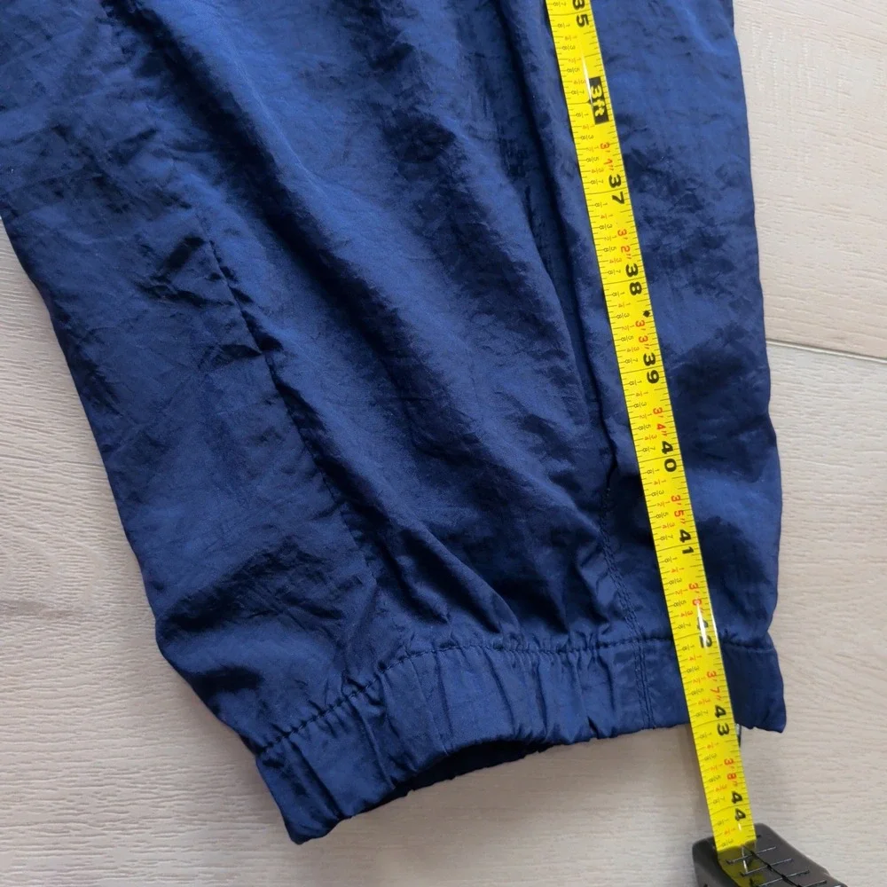 Vintage 90s Nike Men XL Navy Blue Nylon Windbreaker Track Pants Swoosh Ankle Zip
